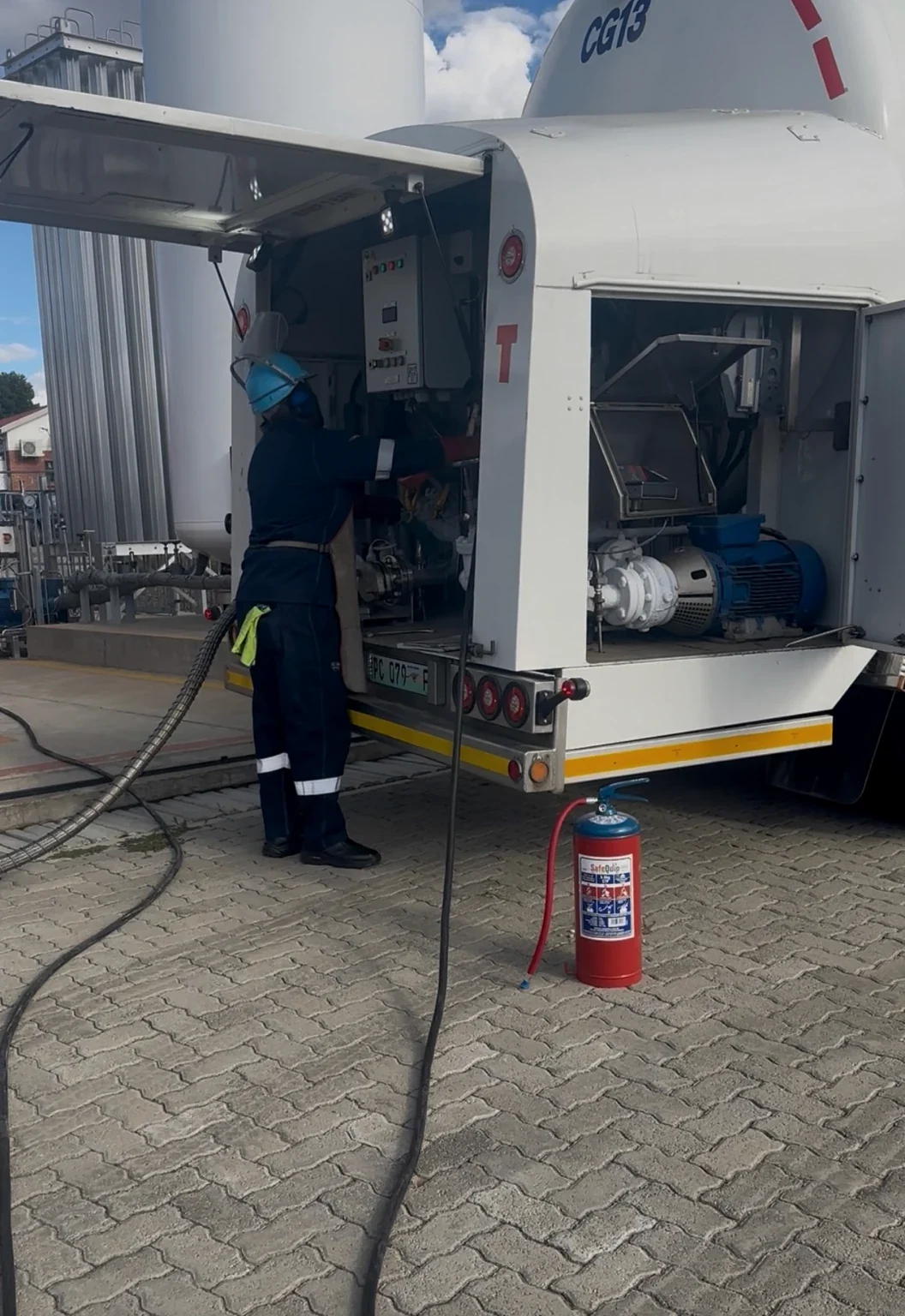 An operator working at the cryogenic delivery controls